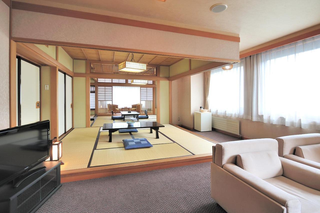 Отель Echigo Yuzawa Onsen Sakura Tei Экстерьер фото
